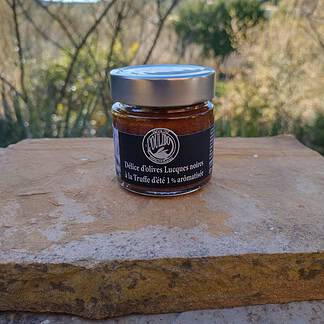 Knop om tapenade met truffel te kopen