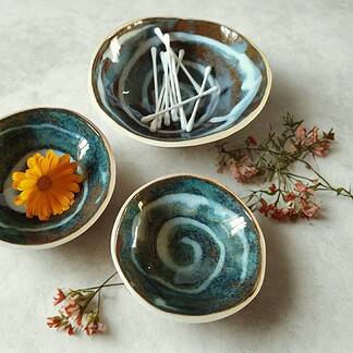 Knop om Blauw-bruin sieradenschaaltjete kopen