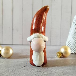 Knop om klein kerstmannetje te kopen