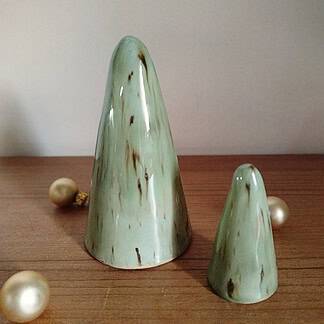 Knop om Decoratieve kerstboompjes te kopen